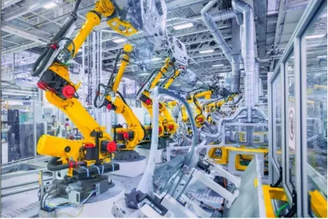 Robots in an assembly line in a factory.