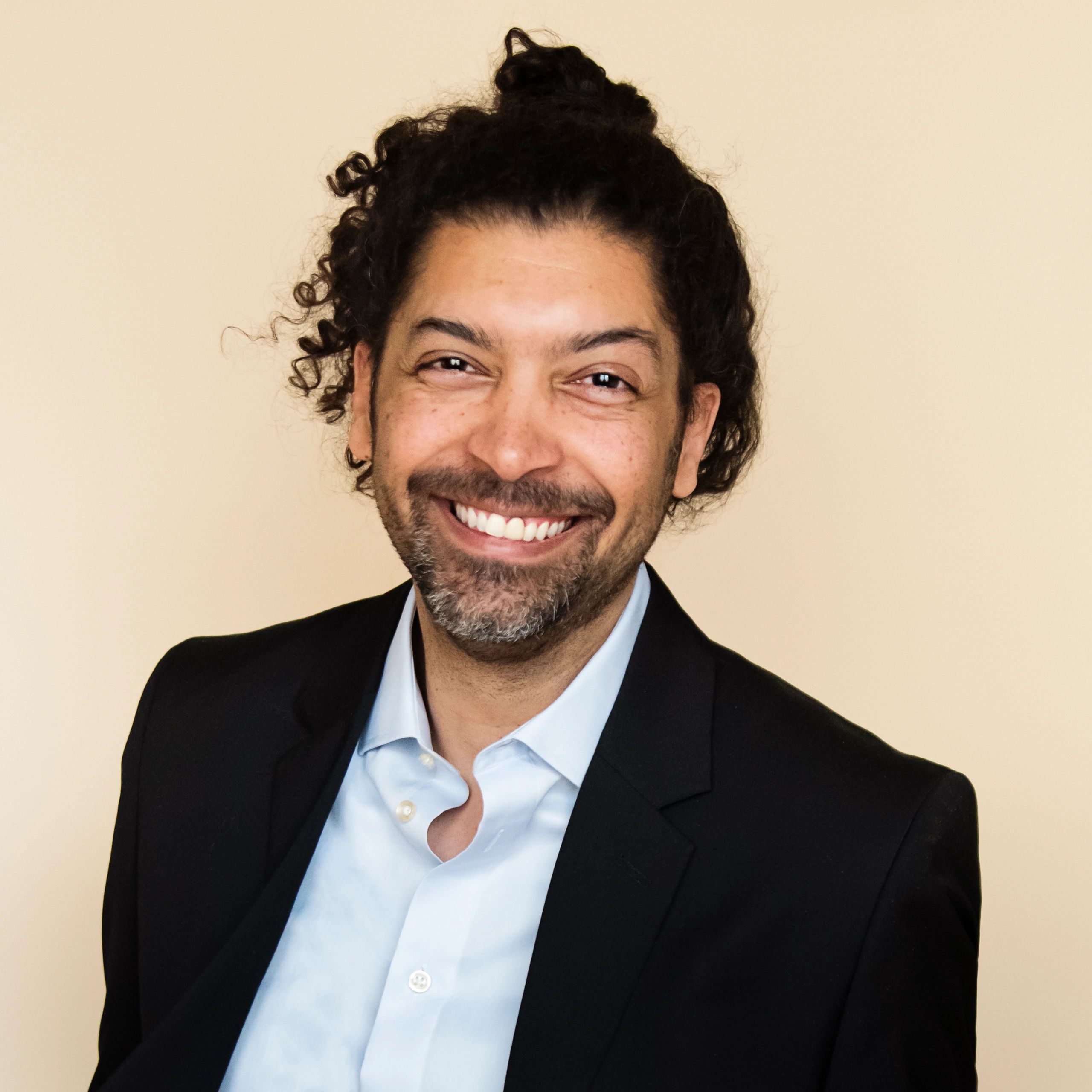 Professional portrait representing strategic advisors