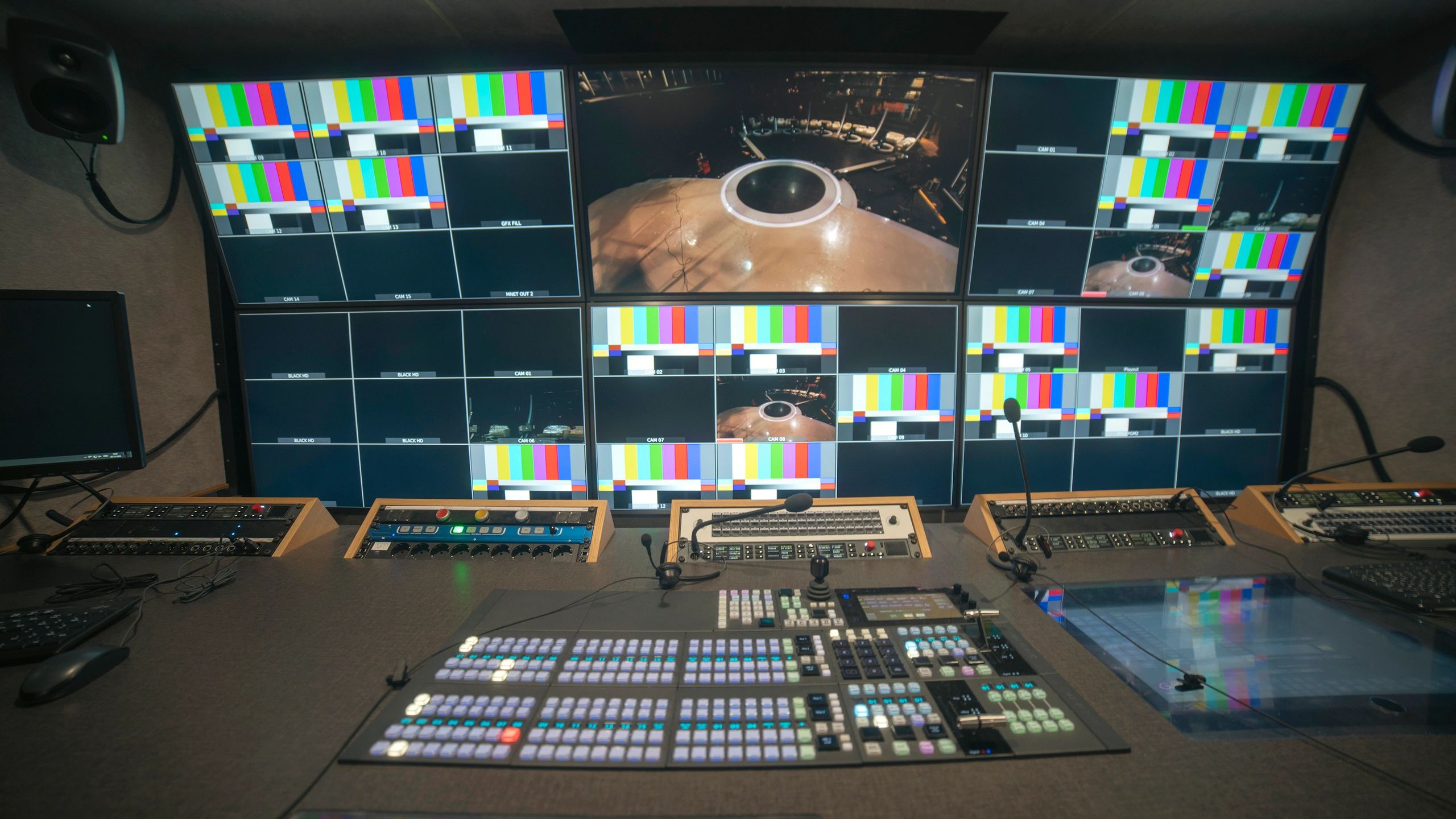 High-tech control room with multiple monitoring screens